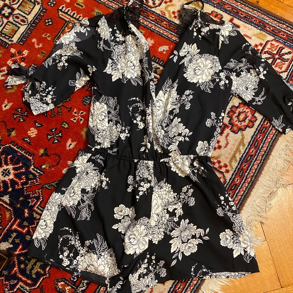 Black and white floral romper with lace